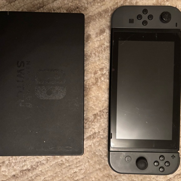 Nintendo Switch with Black Joy-Con, accessories - Picture 3 of 6